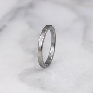 Sculpted steel gamos interlocking engagement and wedding ring