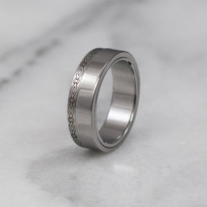 Engraved sculpted steel gamos interlocking engagement and wedding ring